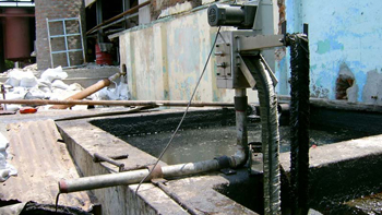 Fabric belt oil skimmer